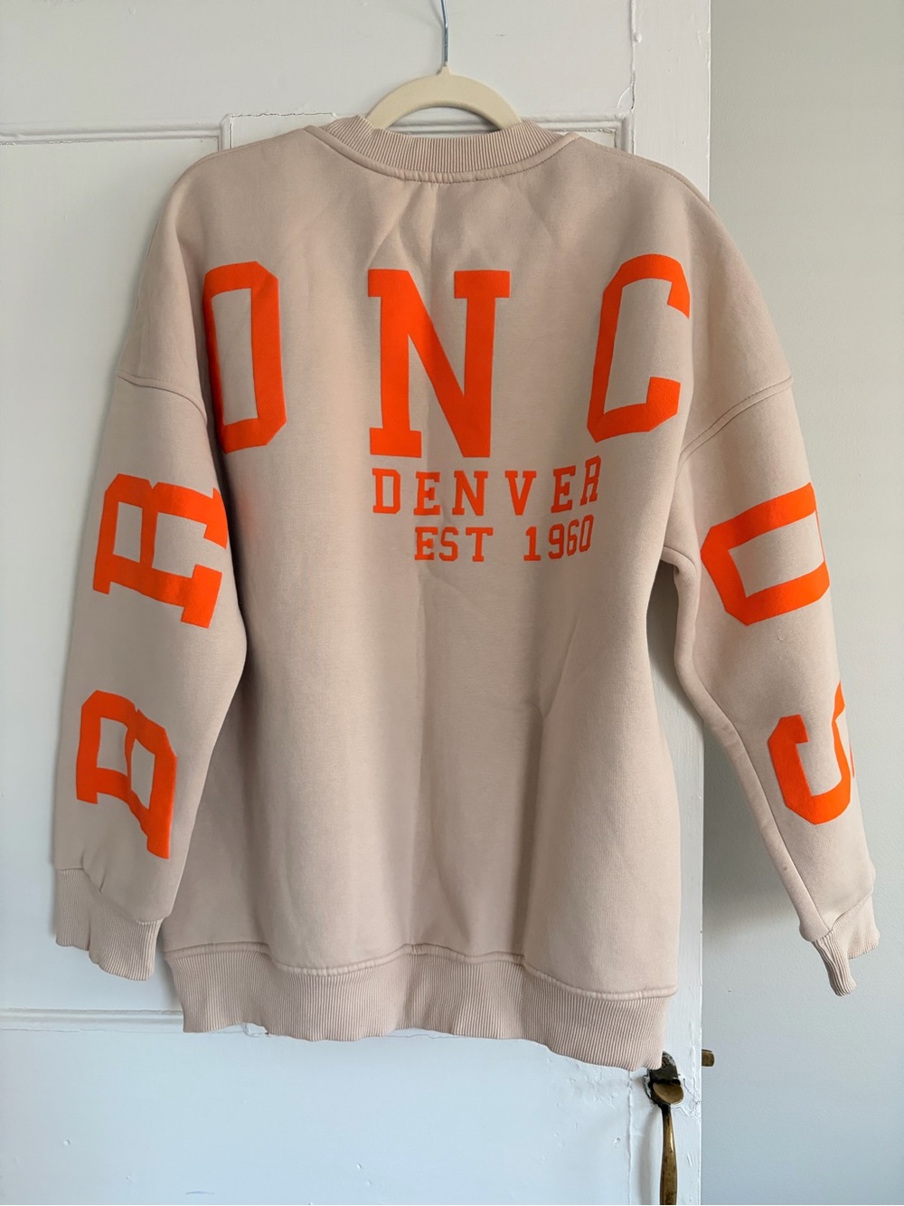 PIRAL Beige Sweatshirt with Orange Graphic Lettering (BRONCOS)